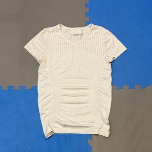 Athleta Cream Perforated V‑Neck Short Sleeve Tee